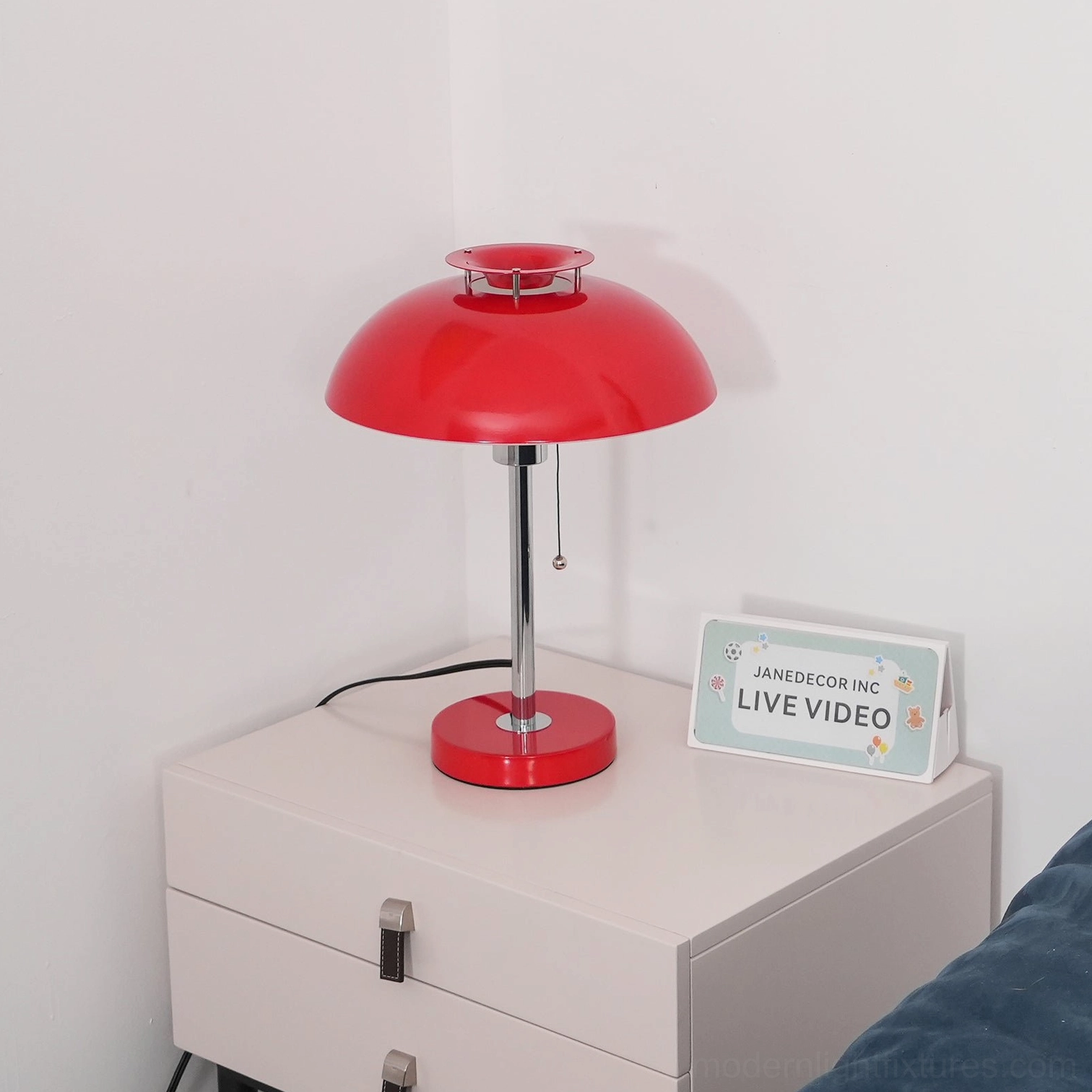 Bowie table lamp side profile emphasizing sculptural dome shade and geometric mid-century form