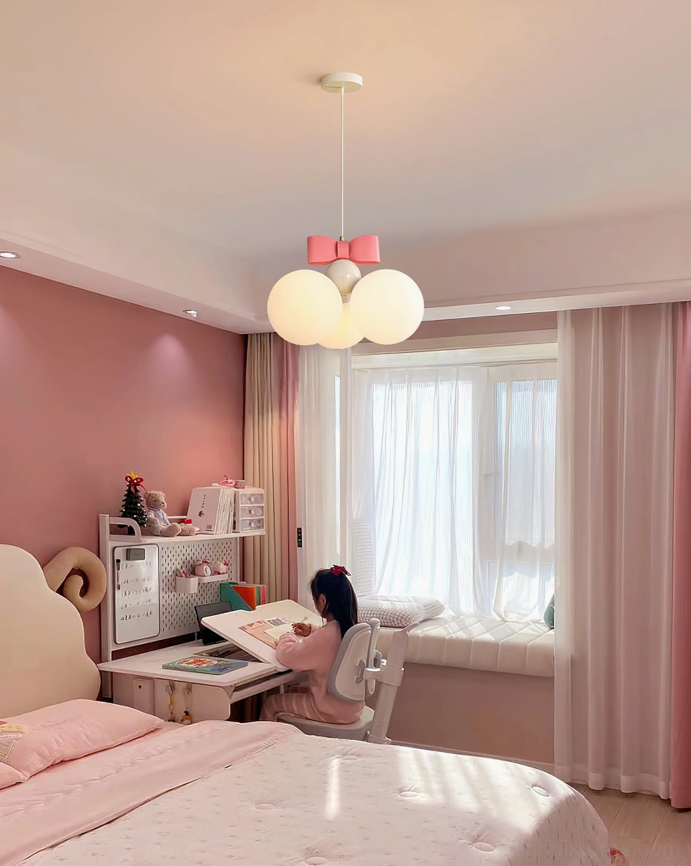 Bowknot pendant light with color options white beige and pink spheres comparison view