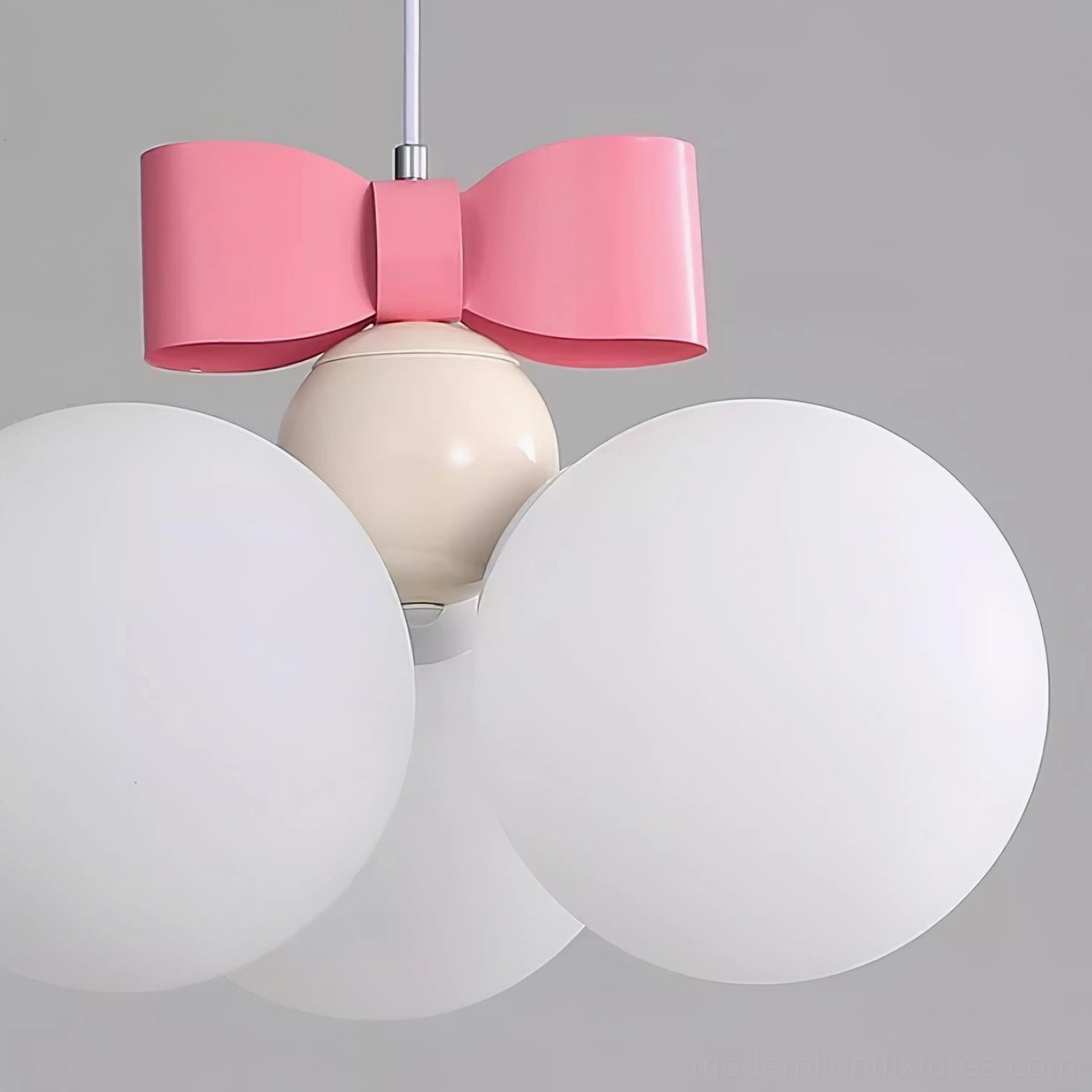 Bowknot pendant light soft ambient glow creating warm inviting atmosphere in bedroom space