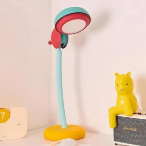 Boyes colorful desk lamp front view showcasing vibrant mint and coral design with pivoting shade