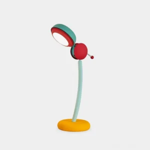 Boyes postmodern table lamp with mint green and coral red color blocking in left three-quarter view