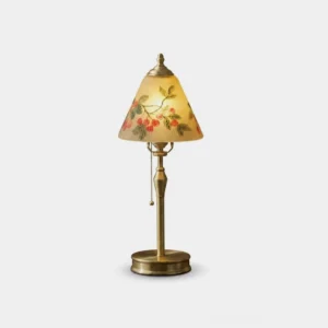 Bramelle hand-painted brass table lamp with conical cherry glass shade, three-quarter front view on white background