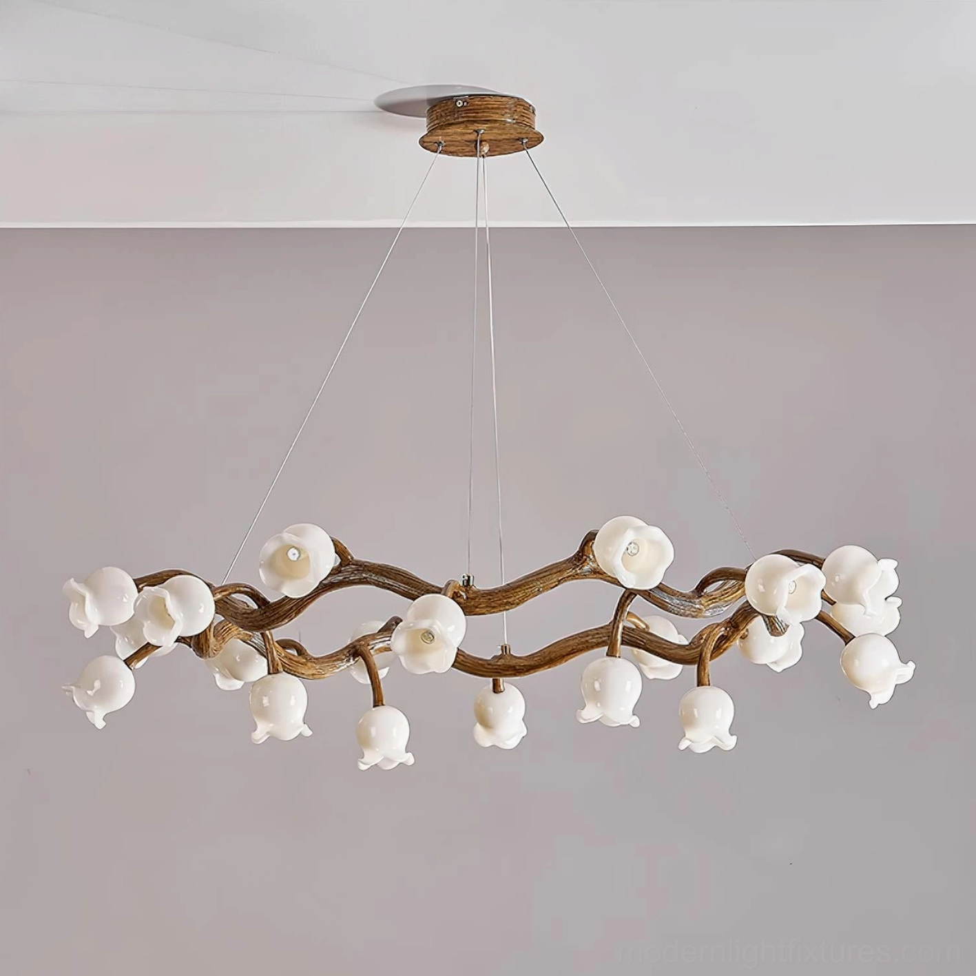 Branch pendant light fixture with multiple flower heads creating soft enchanting illumination