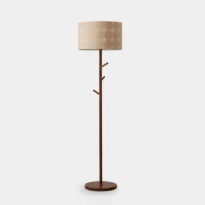Branchway tree-inspired floor lamp with metal branch details and beige fabric shade, studio front view