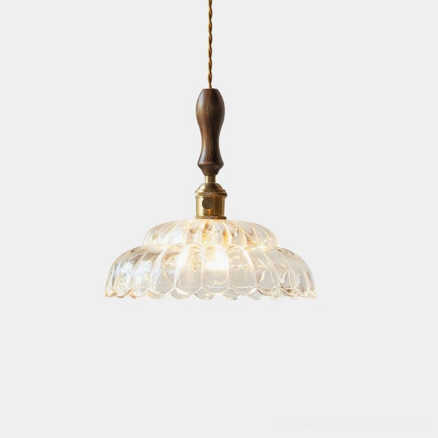 Brandon scalloped glass pendant light with walnut wood handle and brass accents, studio frontal view