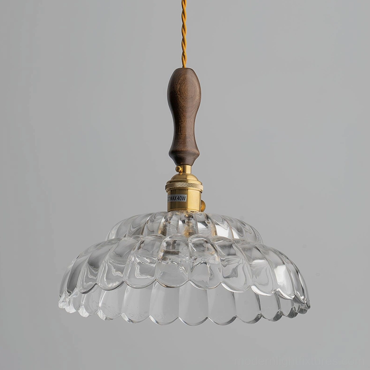 Brandon scalloped glass pendant light low angle, brass product label detail on walnut handle