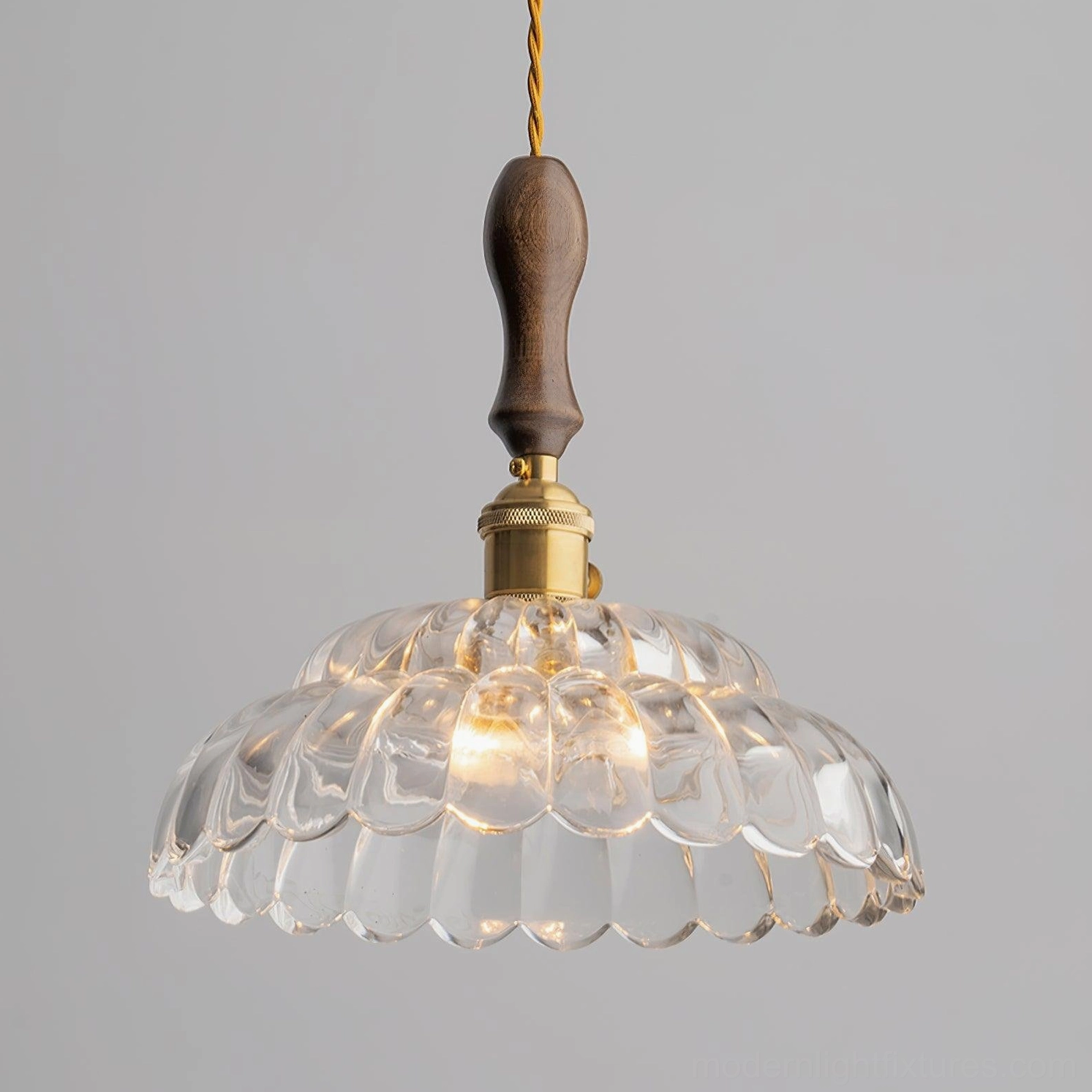 Vintage-inspired scalloped glass pendant light, overhead side view with rustic warm lighting aesthetic
