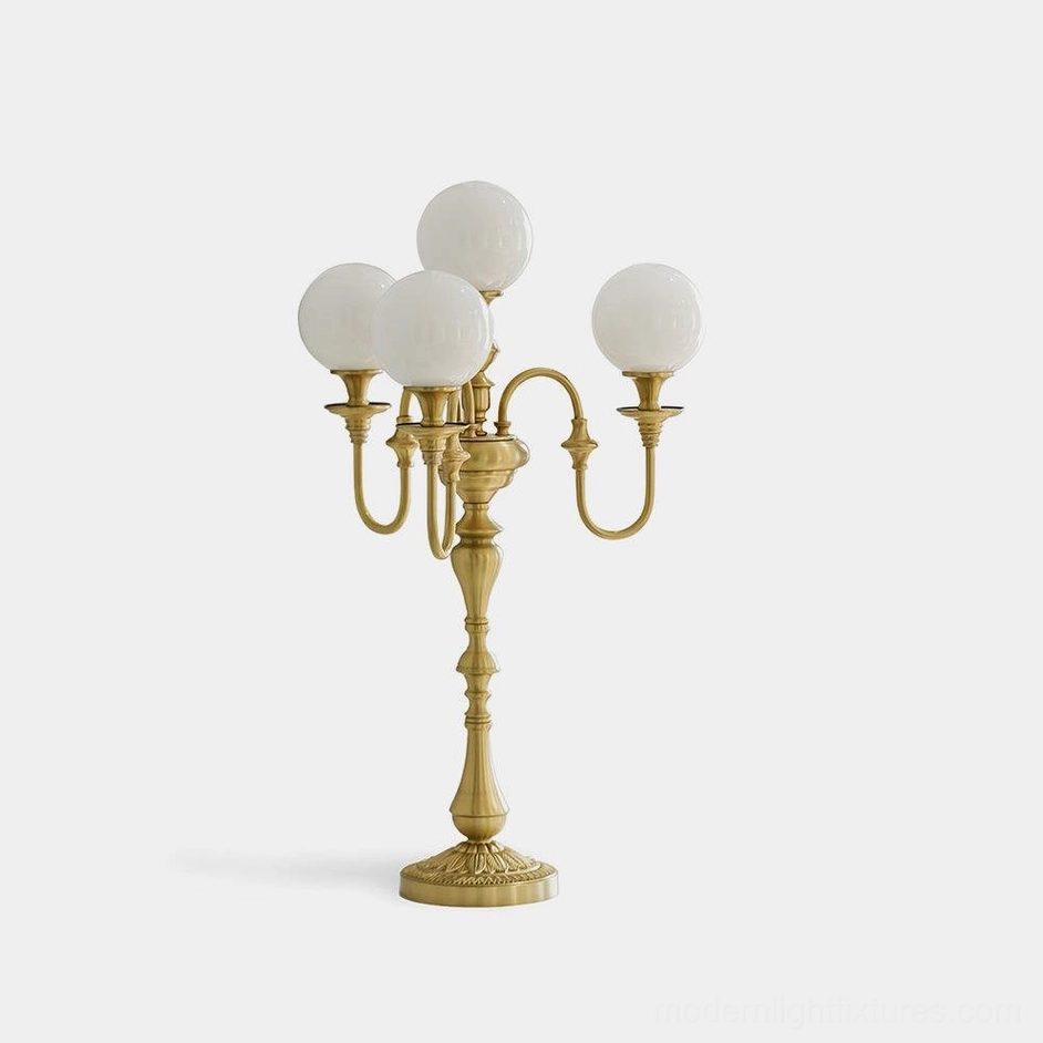 Beatty brass 5-head candlestick table lamp front view with frosted glass shades on white background