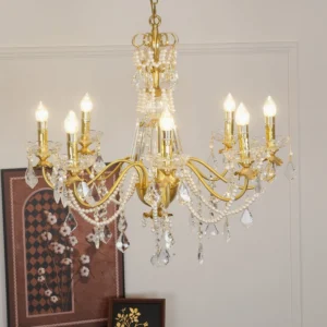 Illuminated crystal chandelier with lit candle-style bulbs in residential interior space, demonstrating warm ambient lighting
