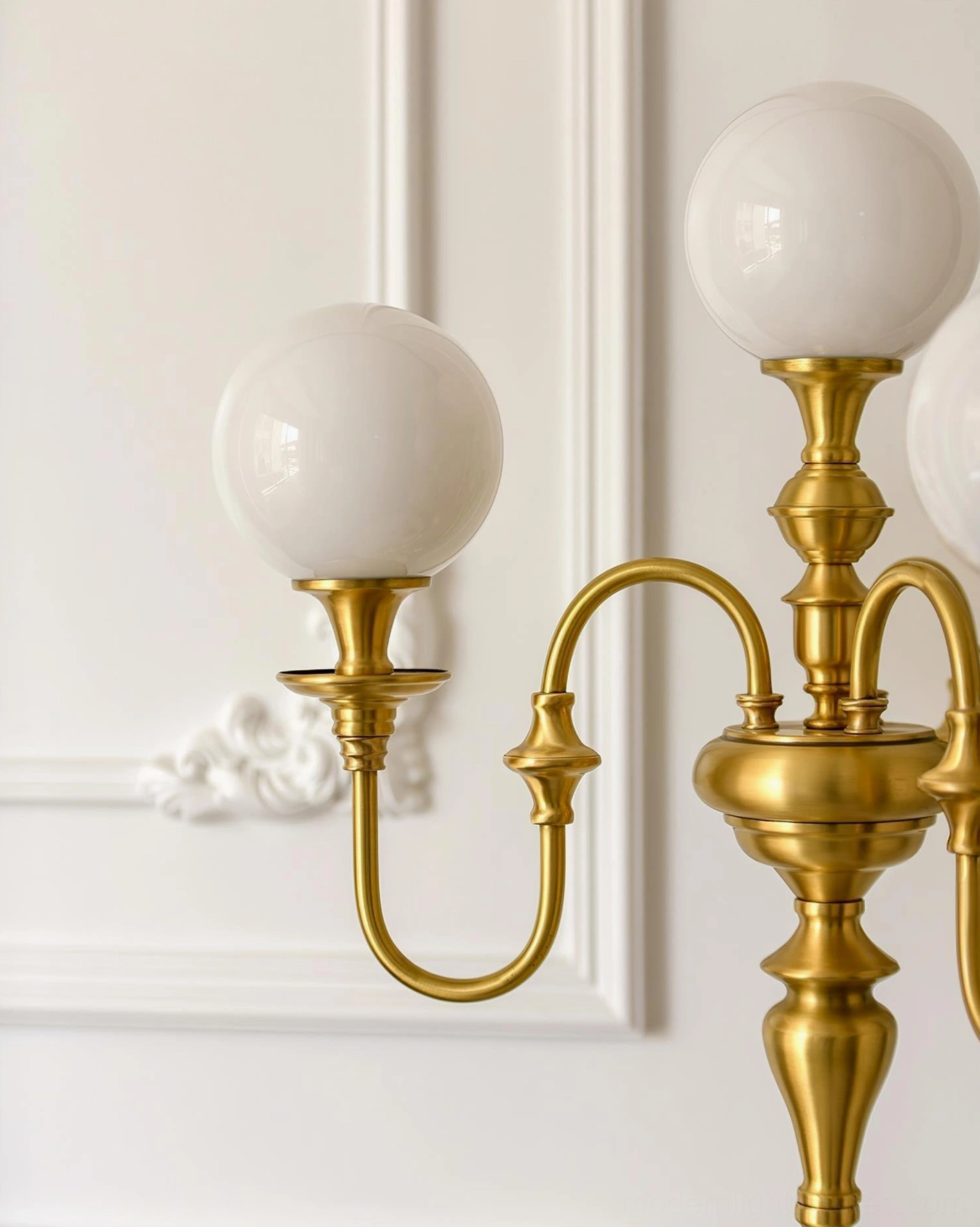 Brass and frosted glass candlestick table lamp showing neoclassical design heritage