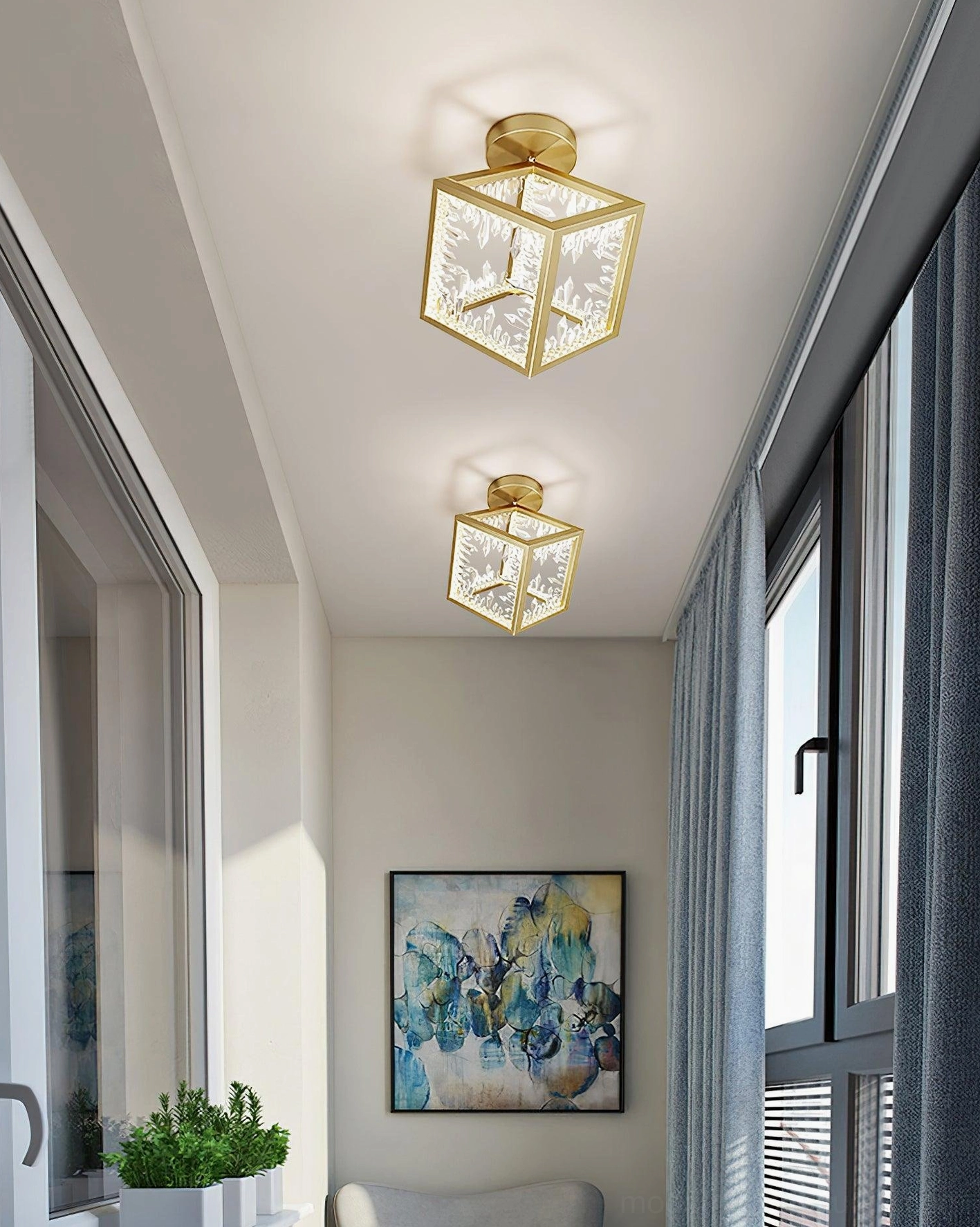 Twin brass gold ceiling fixtures with carved design in residential hallway corridor