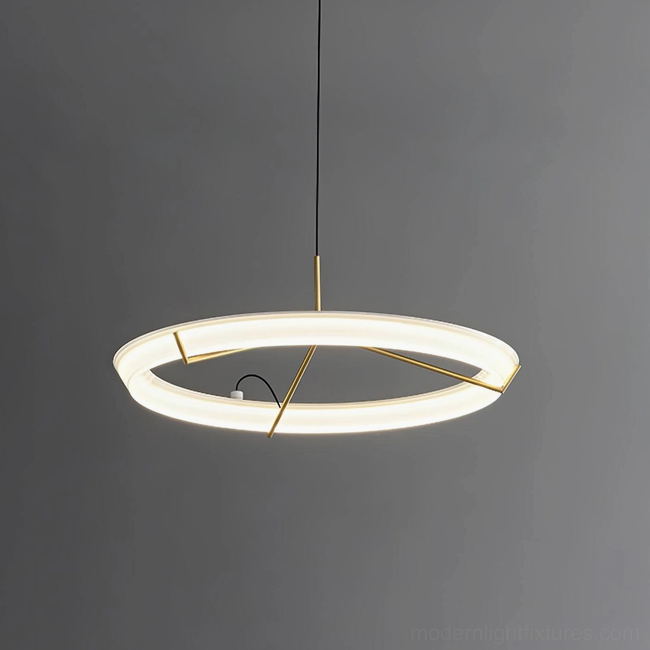 Brass gold round pendant light variant with warm LED illumination for home interior design