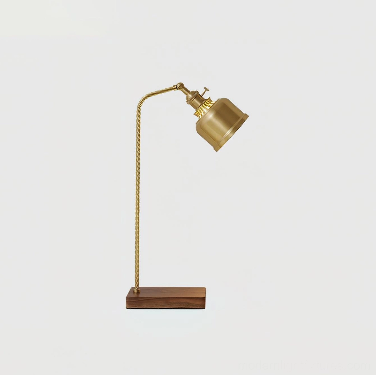 Brass industrial table lamp detail shot showing twisted metal stem and cylindrical shade construction