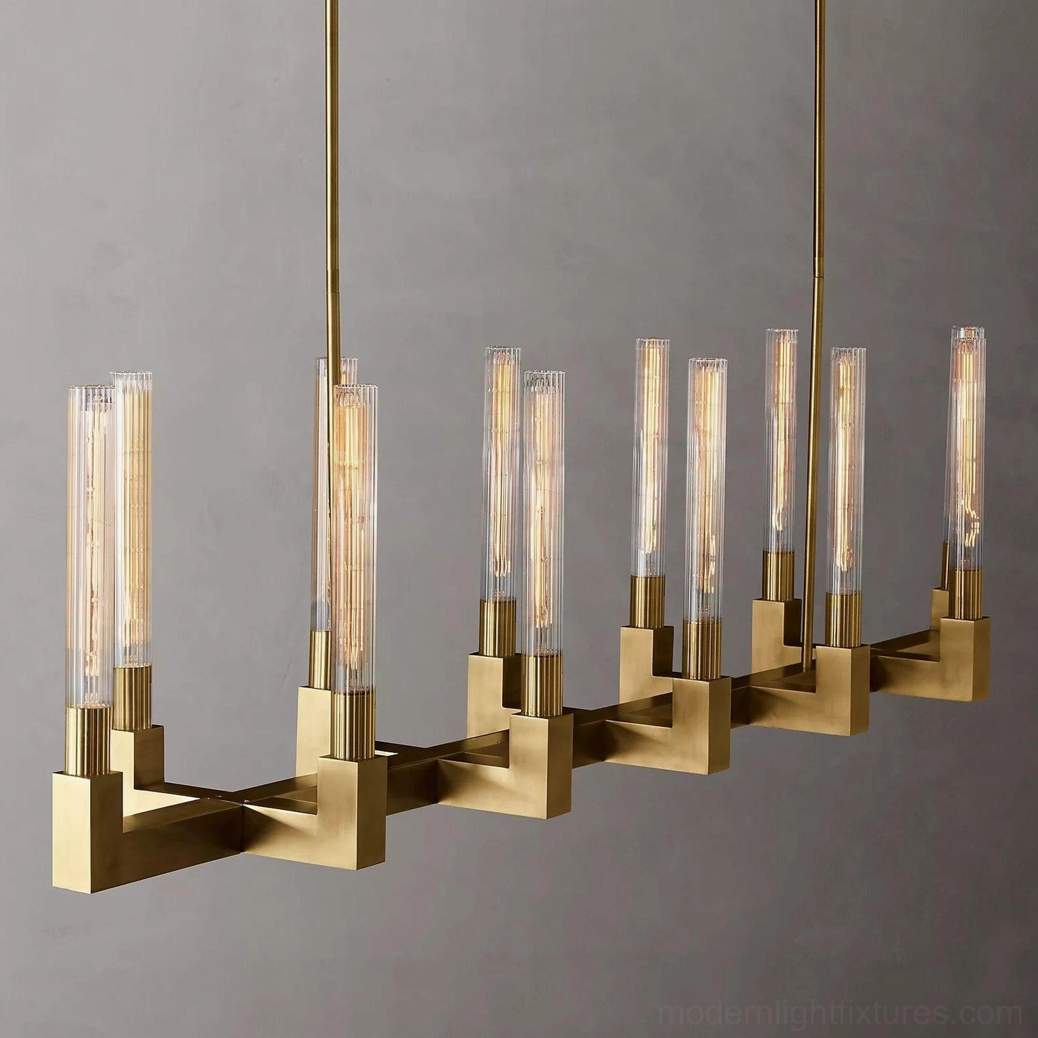 Brass linear glass chandelier luxury residential dining architectural focal point
