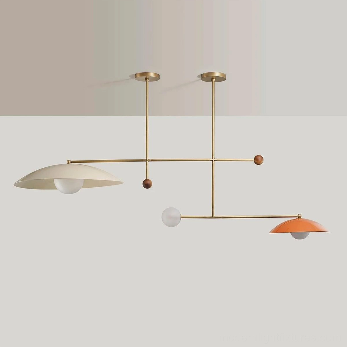 Brass linear pendant chandelier with warm-toned domed shades and wooden sphere accents, contemporary design