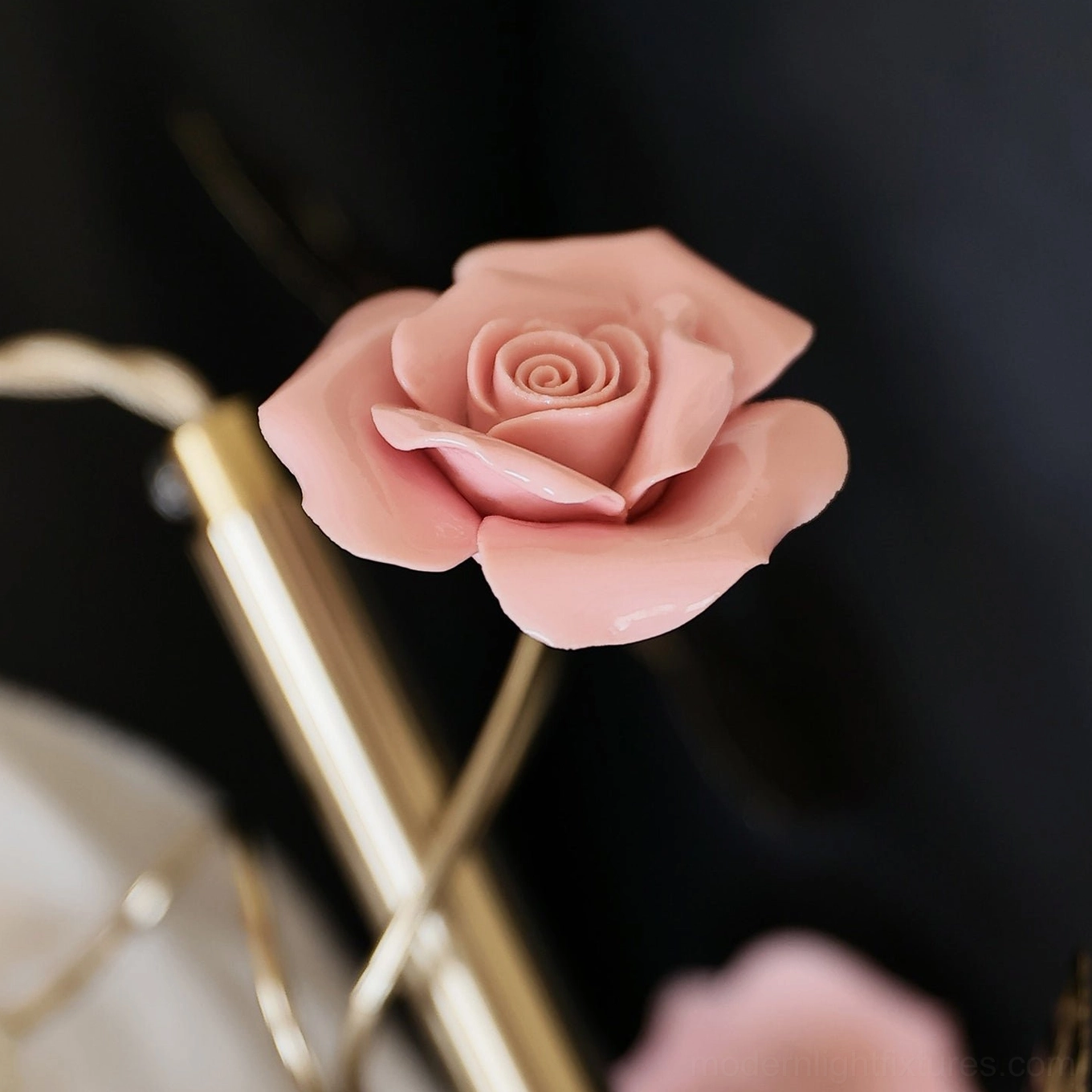 Petalisse floral pendant light with detailed pink rose accents and brass stem ornamentation