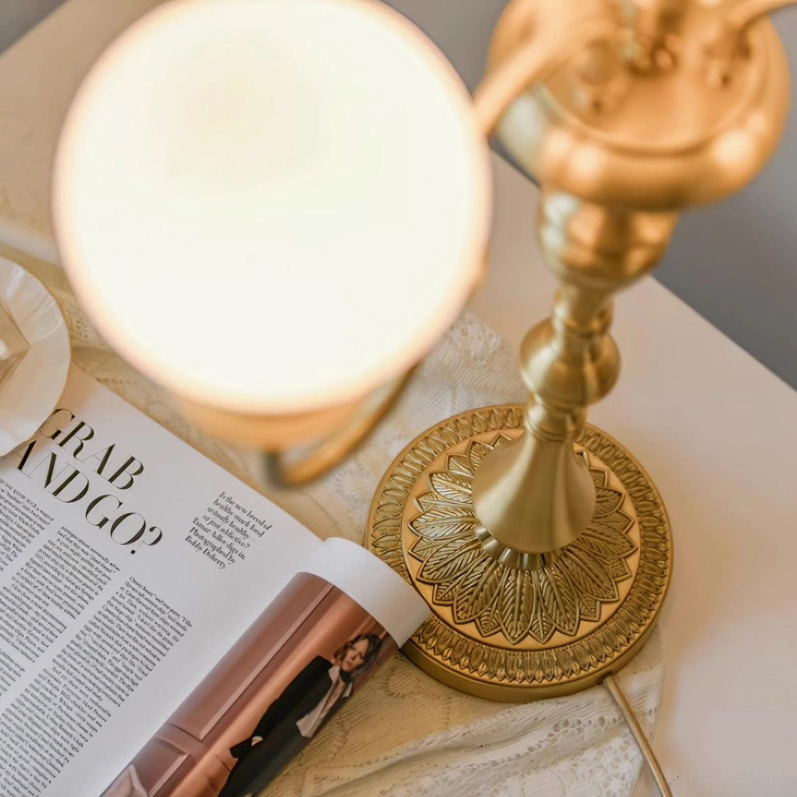 Beatty brass table lamp available with EU UK US AU plugs for international compatibility