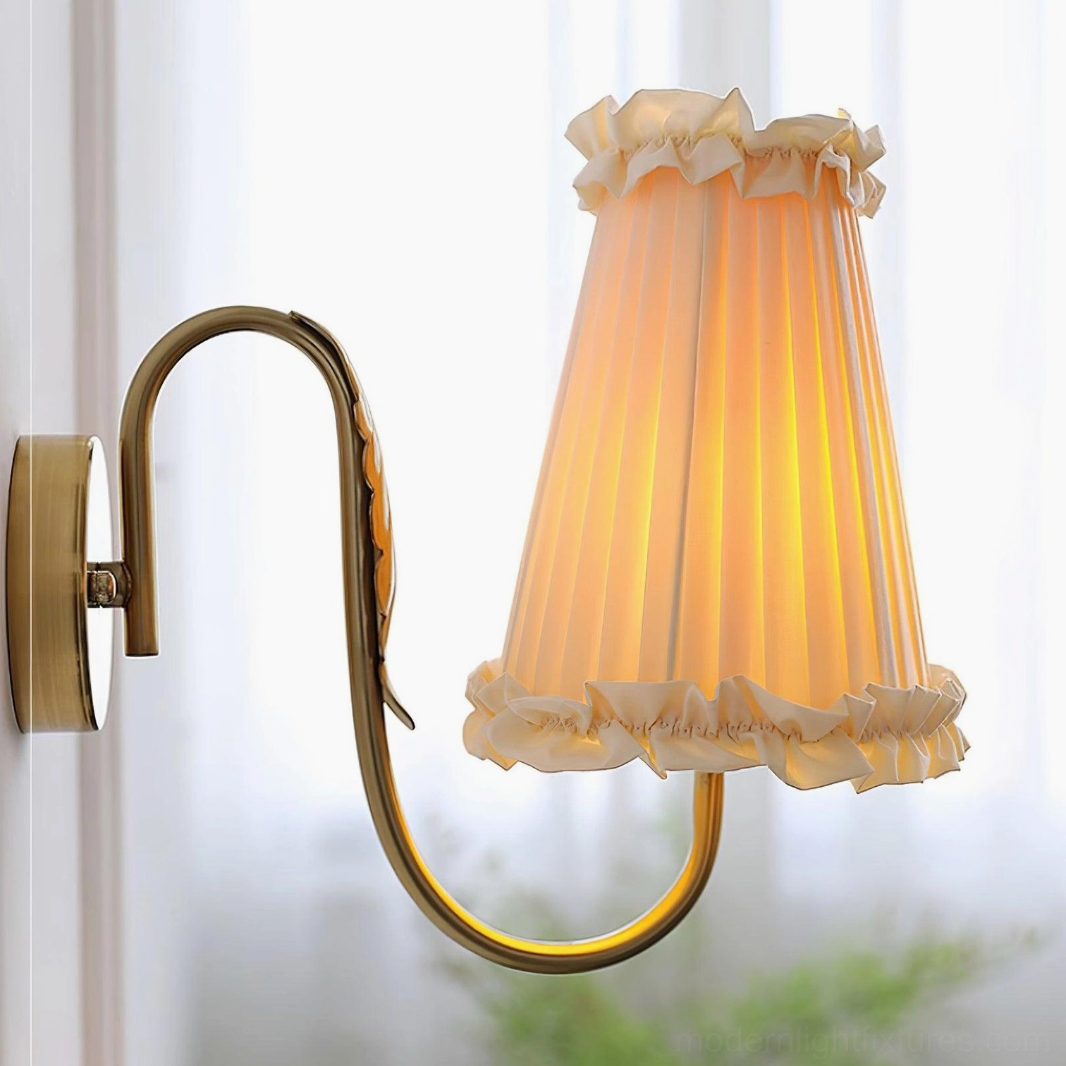 Brass wall sconce pleated shade construction and fabric quality detail
