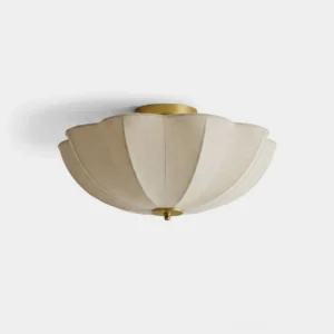 Bravelle scalloped fabric flush mount ceiling light with warm brass hardware and natural linen-look dome, front view on white background