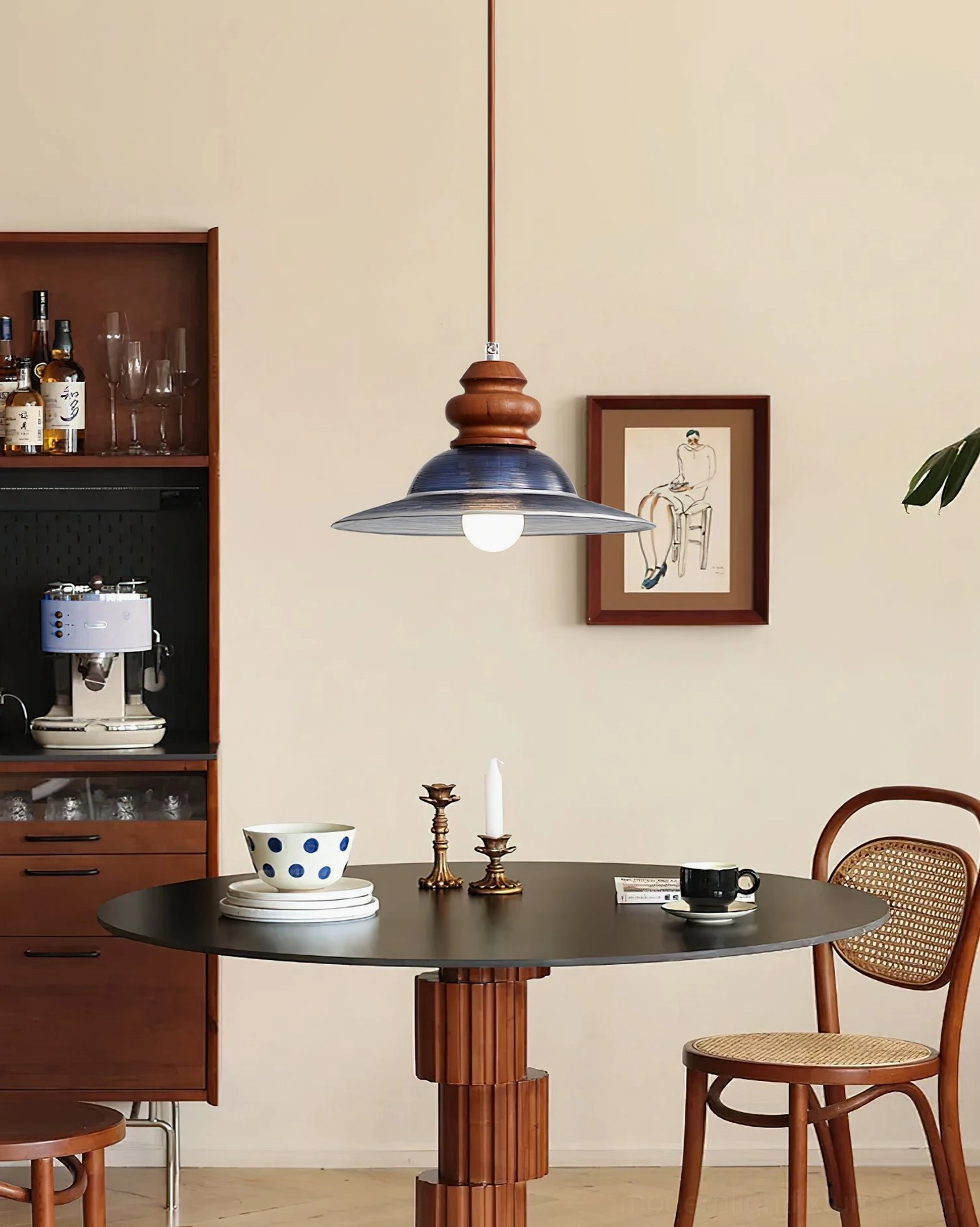 Brenna pendant ceiling light installed in vintage farmhouse dining room with retro decor