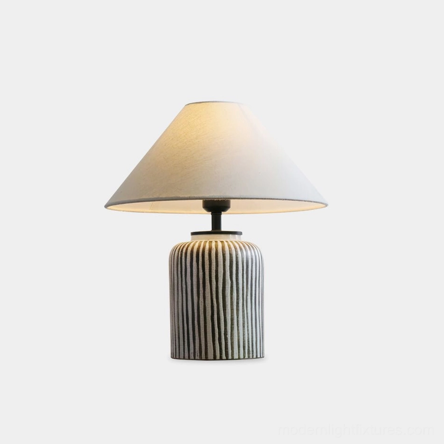 Brenton striped ceramic table lamp with hand-painted vertical design, front view on white background