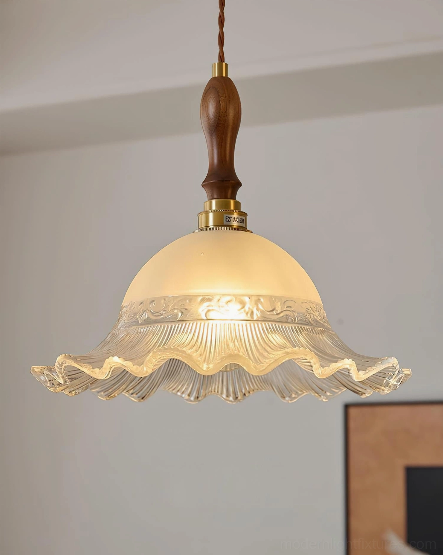 Multiple Brielle pendant lights in various glass colors demonstrating color options