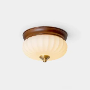 Brioche ribbed glass ceiling lamp with walnut wood canopy and brass hardware, studio close-up front view