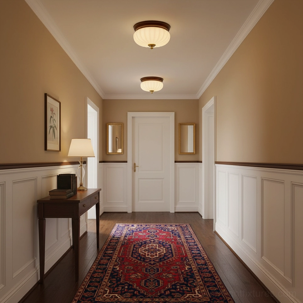 Pair of Brioche flush mount ceiling lights installed in classic wainscoted residential hallway corridor