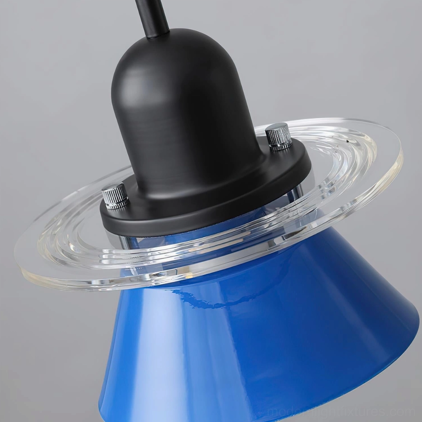 Modern geometric pendant lamp with metal cone shade and acrylic accent, architectural lighting design