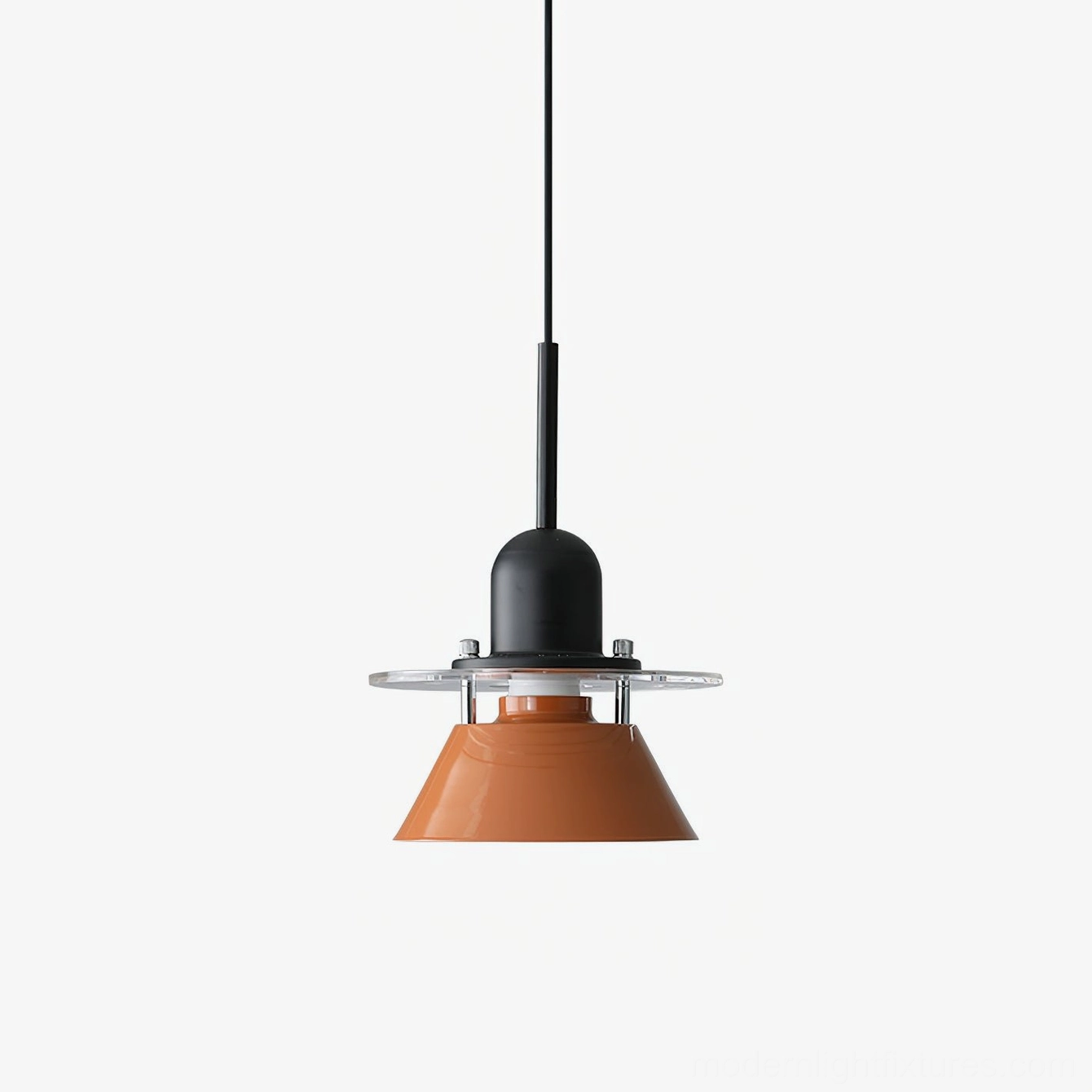 Orange vibrant pendant light with bold cone metal shade, contemporary design studio background