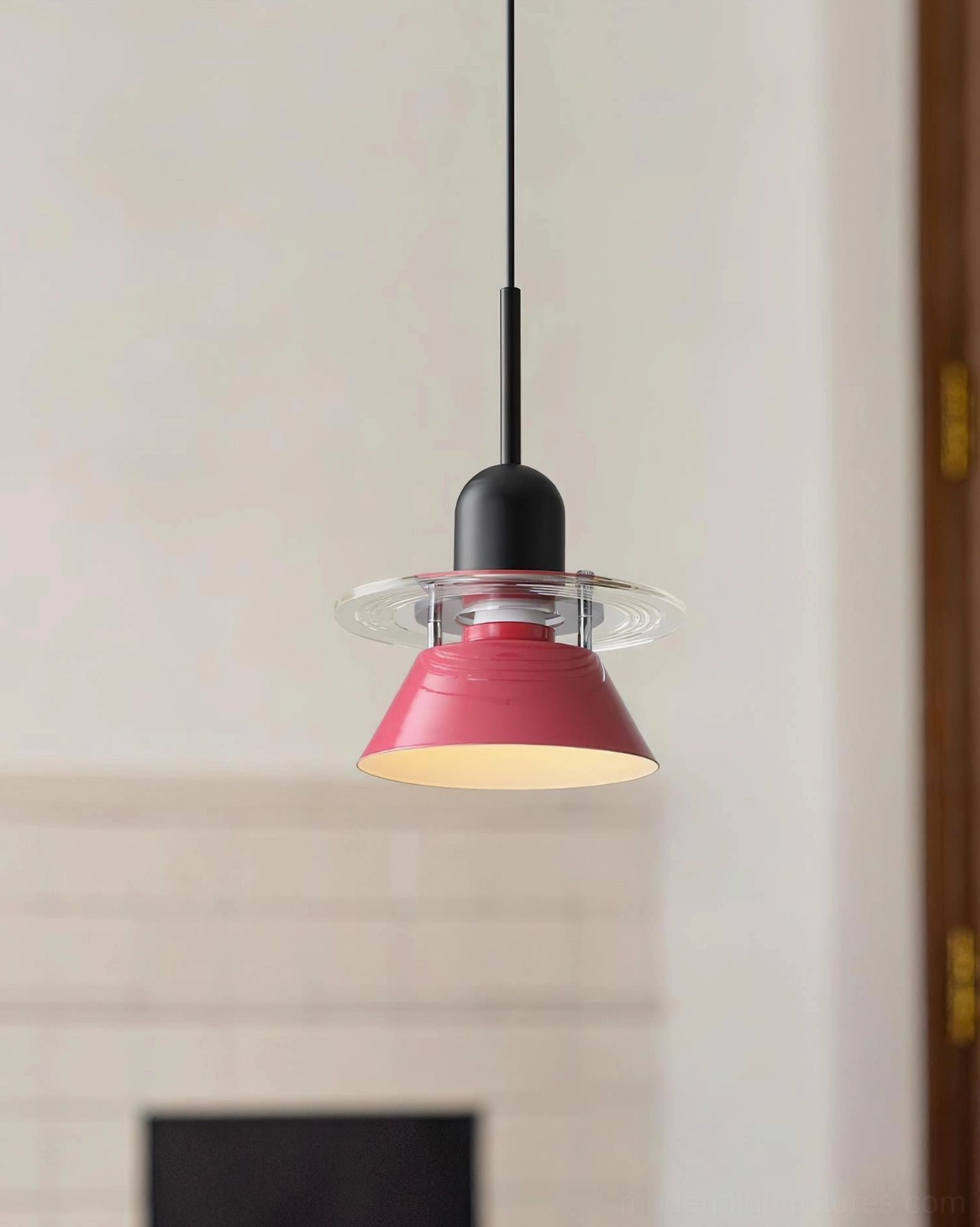 Rose red modern pendant light shade with off-white interior and acrylic trim against fireplace wall