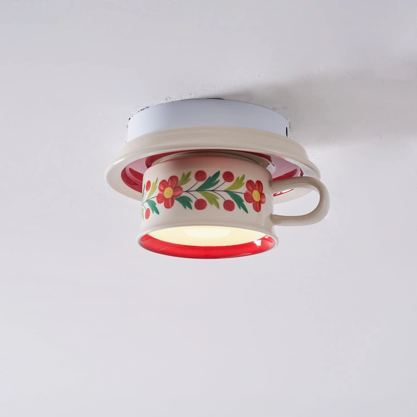 Brisa tea cup ceiling light artistic detail showing hand-painted floral ceramics and refined craftsmanship