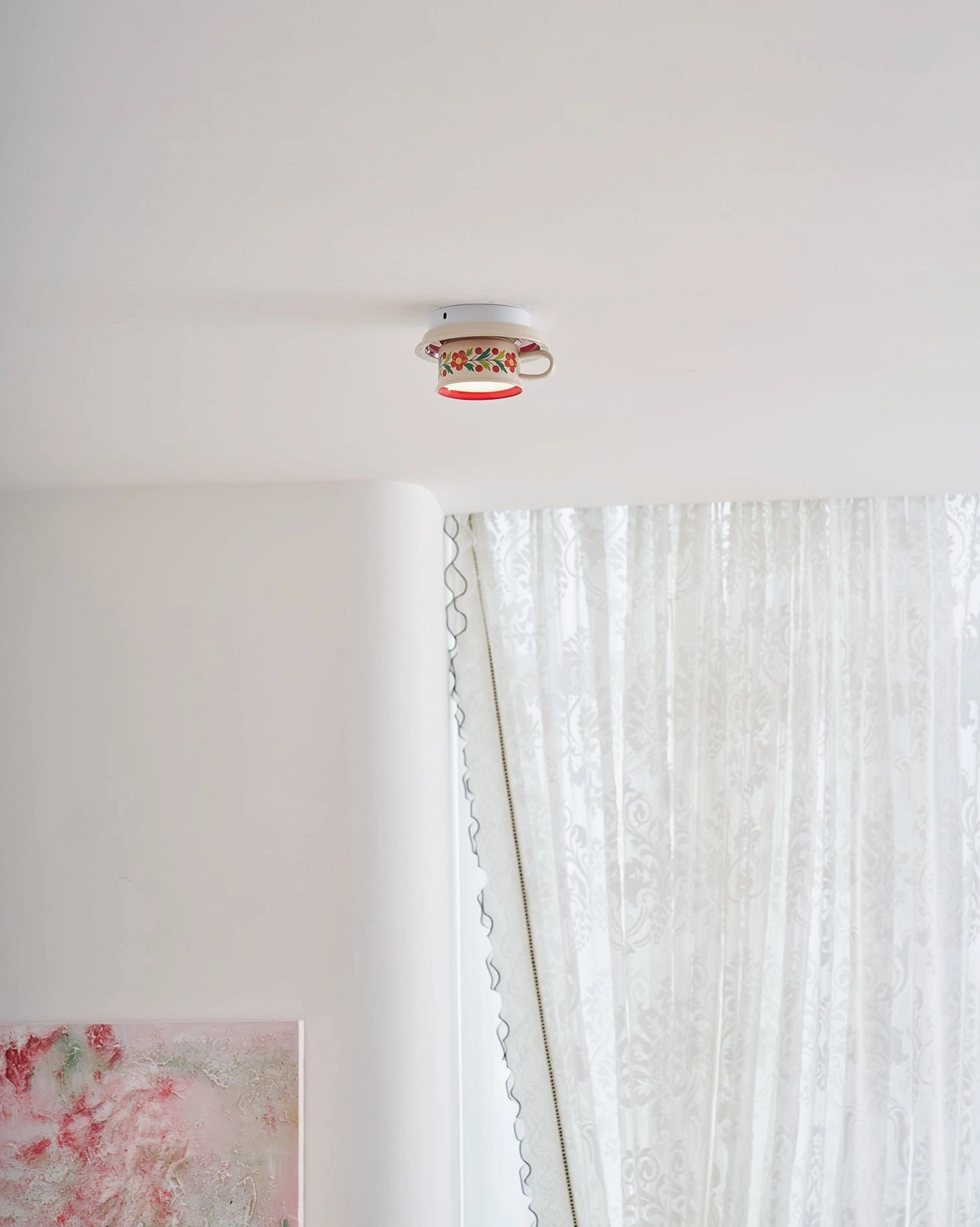 Brisa hand-painted ceramic ceiling fixture close-up of teacup handle detail and refined glazed surface