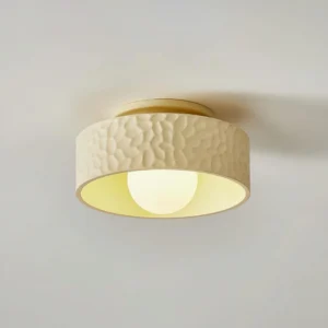 Brito minimalist flush mount ceiling light yellow white color option side angle with warm ambient lighting