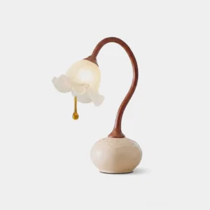 Brivana botanical table lamp with frosted glass fluted shade, walnut curved stem, and ceramic base - front studio product photography