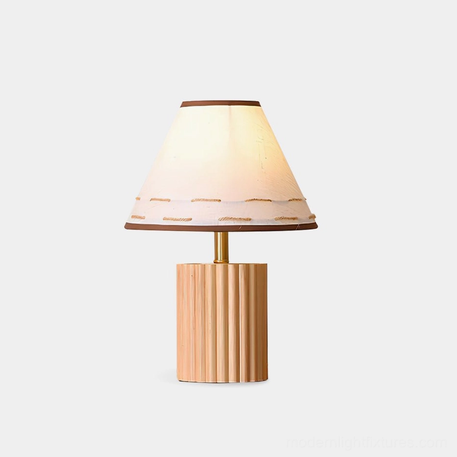 Brooke wooden table lamp with light natural wood fluted base and tapered fabric shade, front studio view