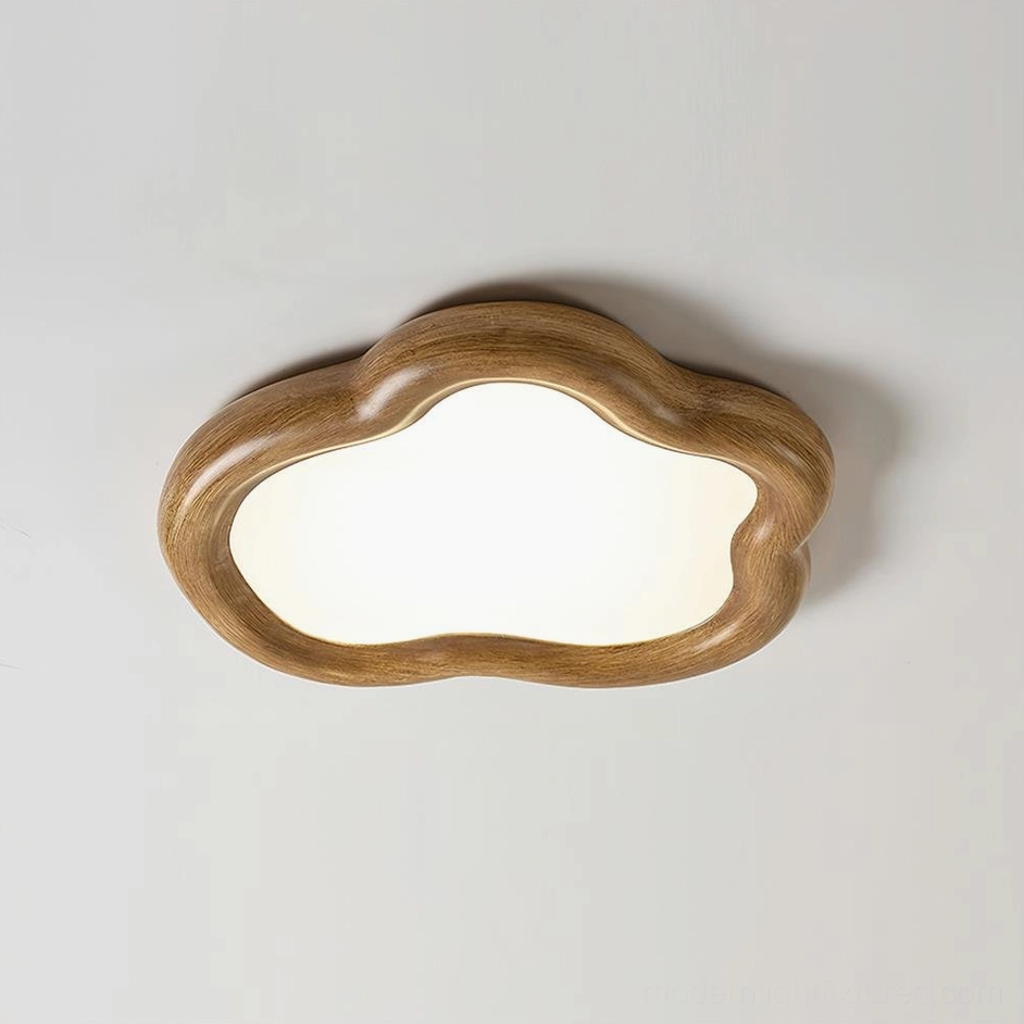 Brown wood-grain frame cloud flush mount light close-up front view showing smooth light-emitting panel detail