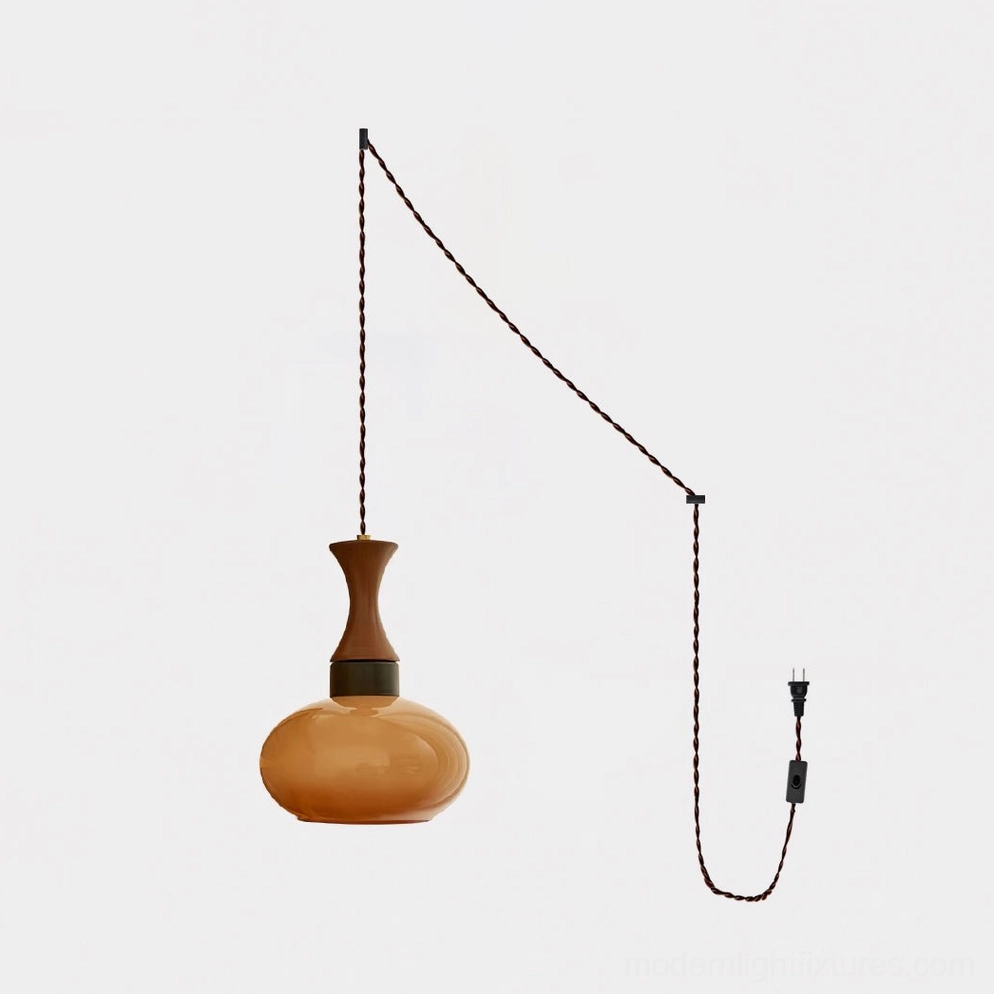 Warm brown glass pendant light with vintage aesthetic and modern minimalist design