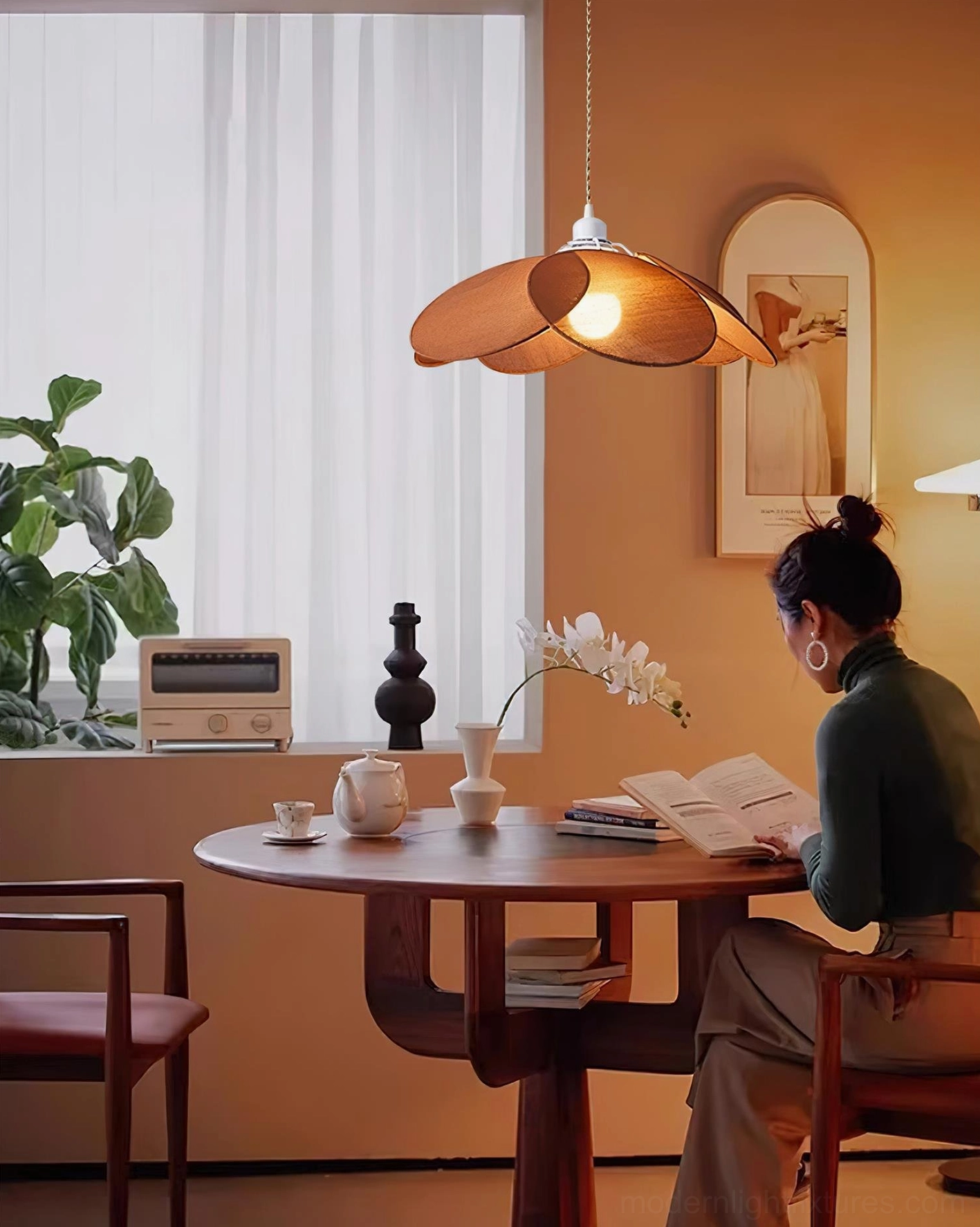 Brown petal pendant lamp in cozy residential dining nook with warm ambient lighting