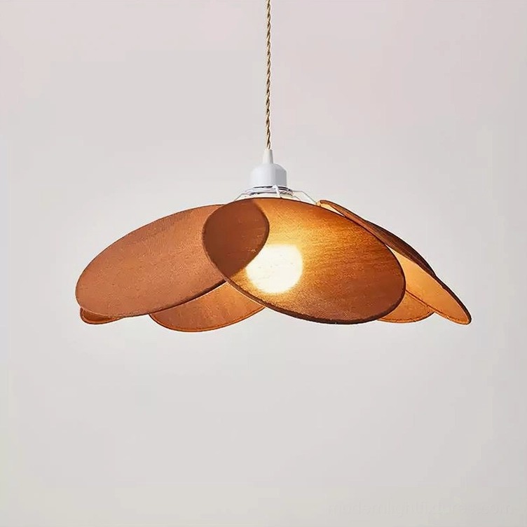 Brown fabric petal pendant shade with visible interior bulb in close-up overhead view