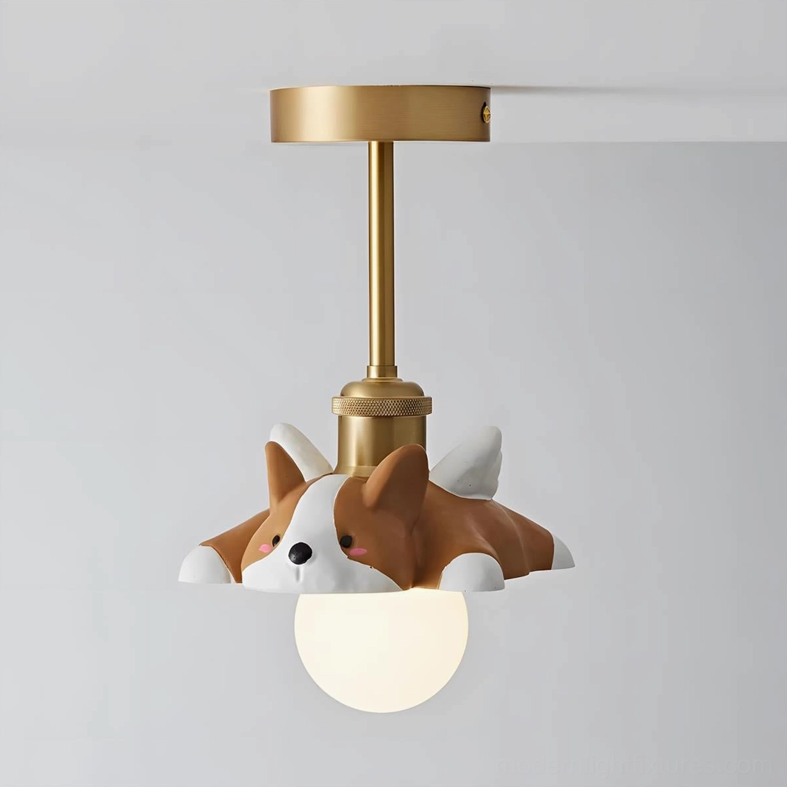 Brown tiger winged ceiling light fixture in studio setting, showcasing brass and resin animal design with frosted glass illumination