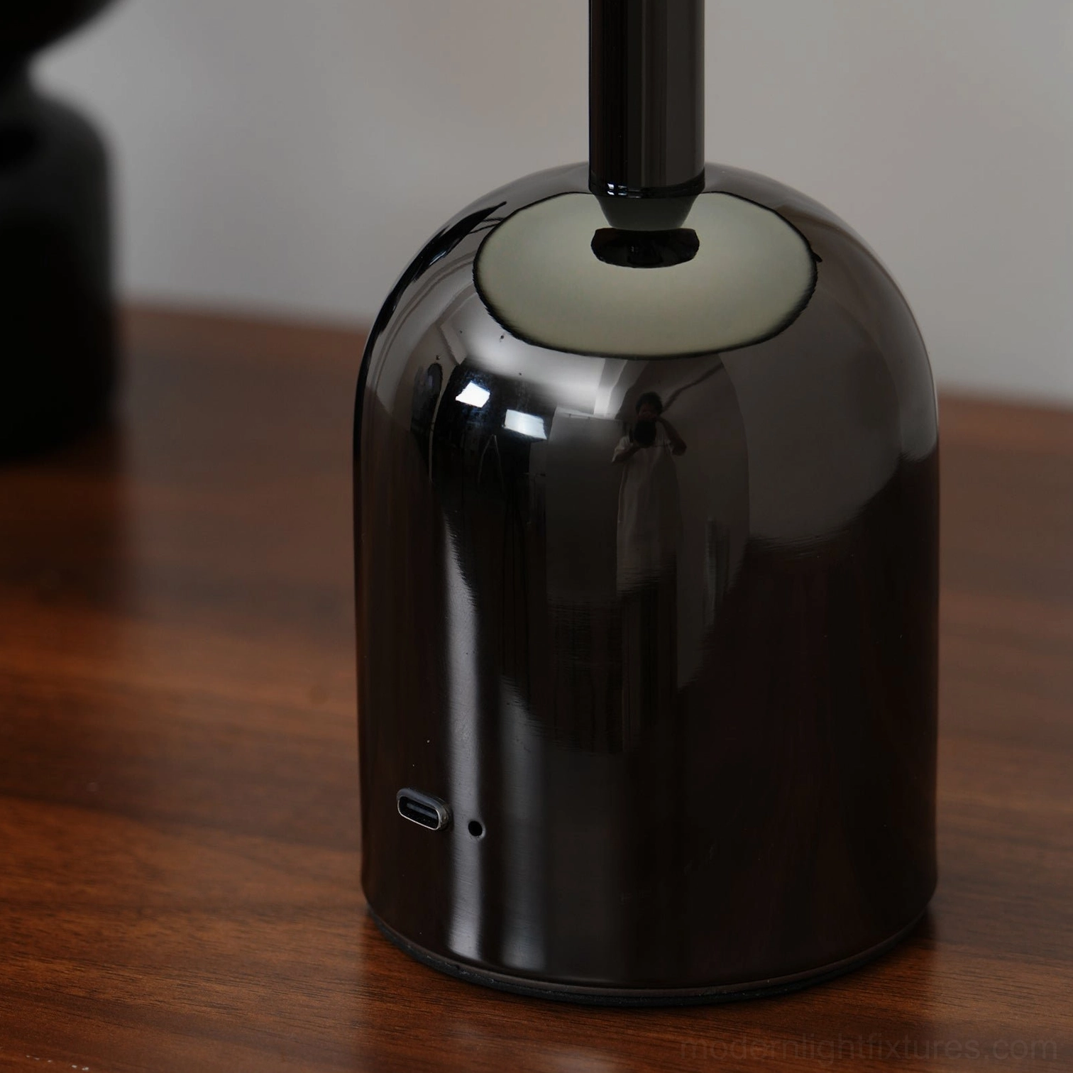 Black Brulee portable lamp creating glare-free uniform light distribution in living space