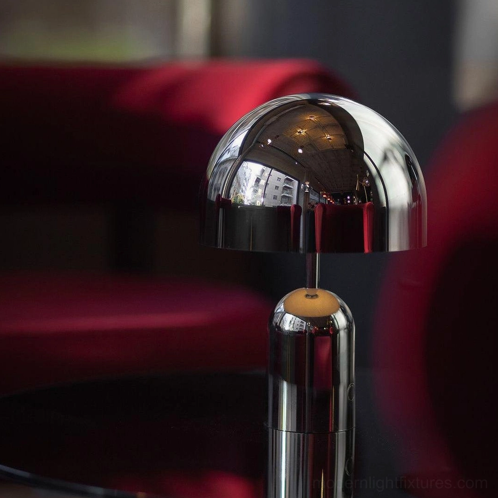 Gold Brulee portable lamp creating warm evening ambiance in transitional interior style home