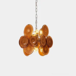 Brunelle modern pendant chandelier with amber glass discs and chrome hardware, front close-up shot showing mid-century clustered design