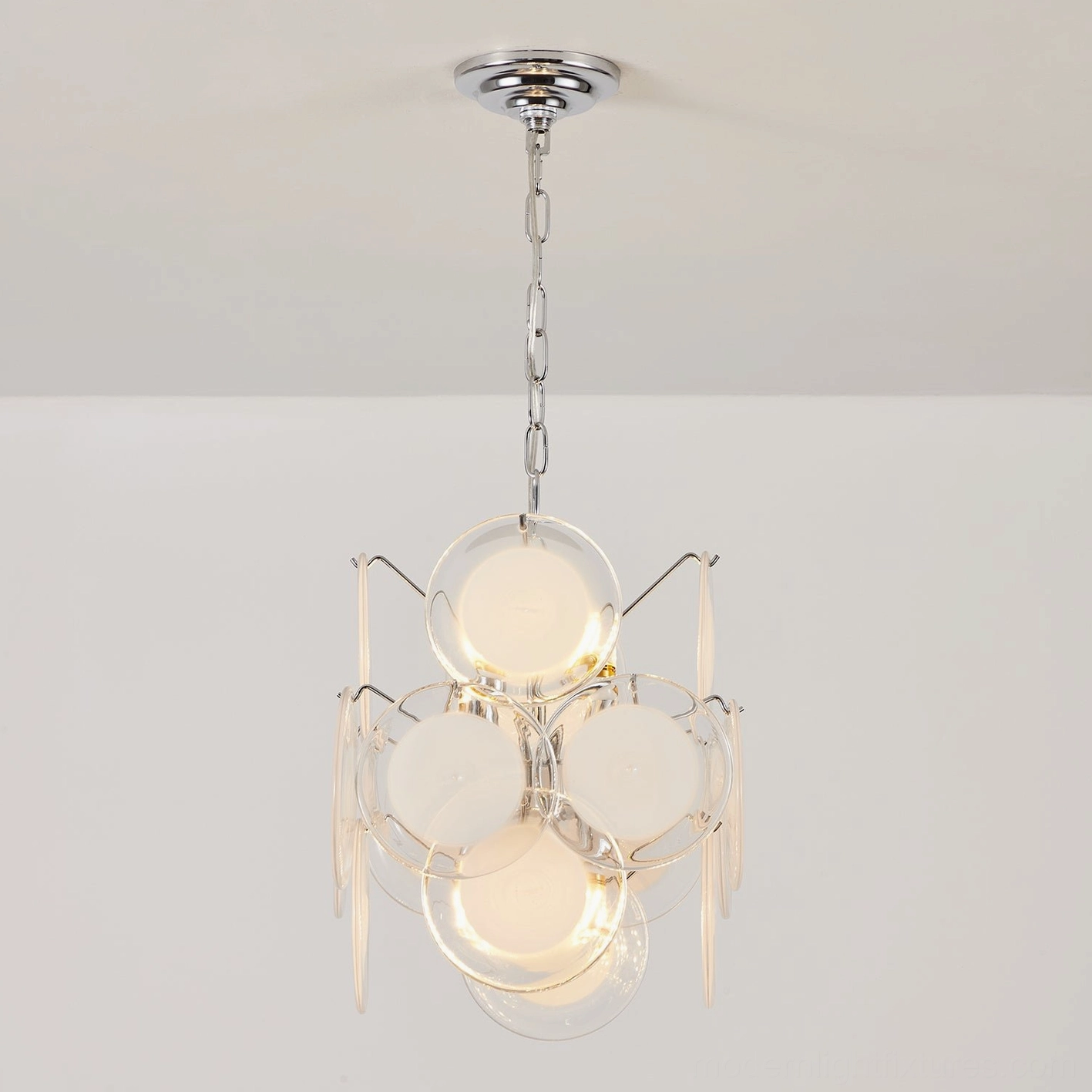 Brunelle pendant chandelier with curved glass discs and polished metal framework, mid-century modern design
