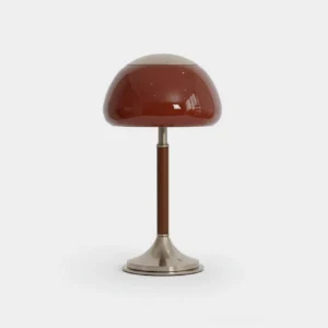 Brunello mid-century modern table lamp with glossy burgundy dome shade and brushed metal base on white background