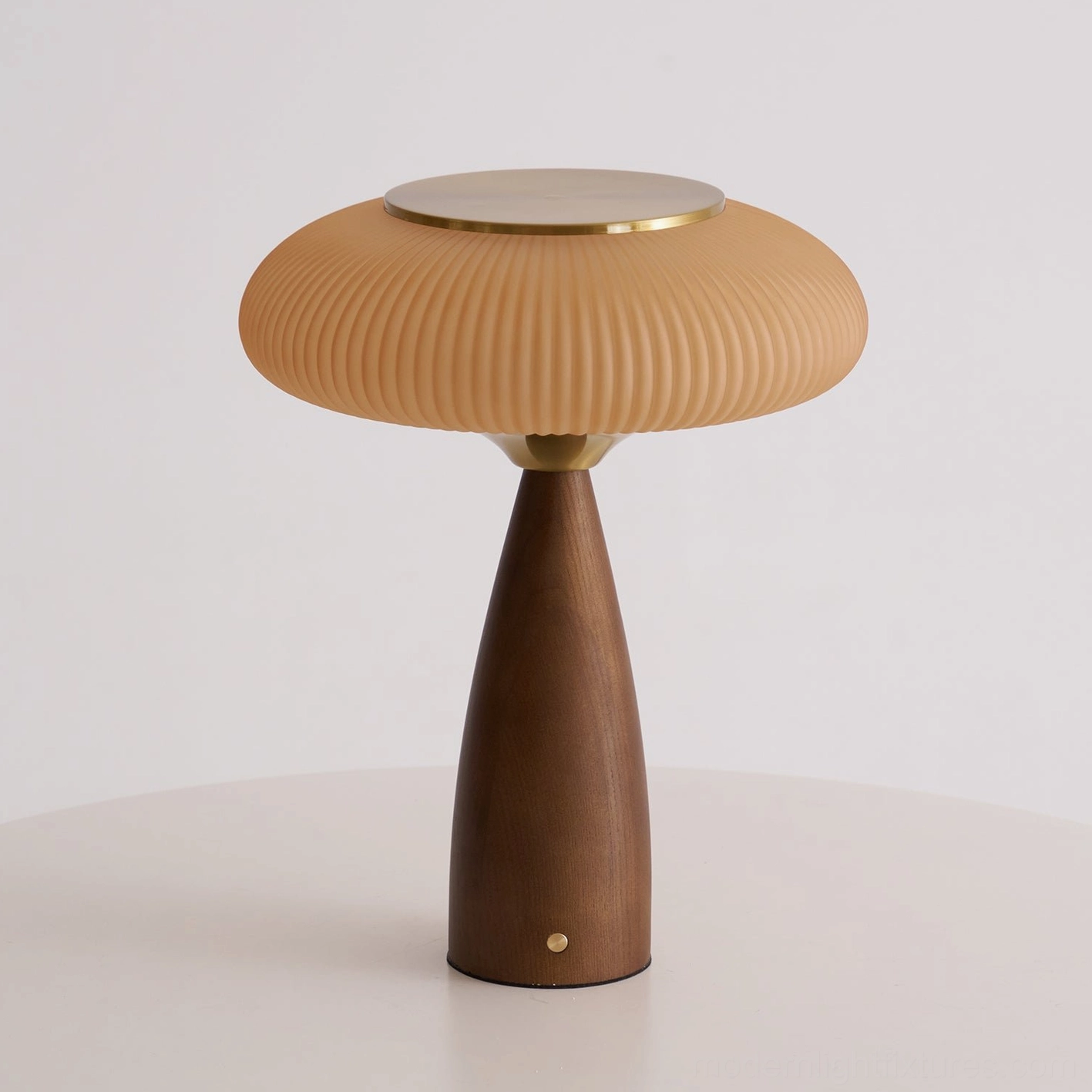 Brynn cordless table lamp unlit front studio view showcasing ribbed glass shade and walnut base with gold accents