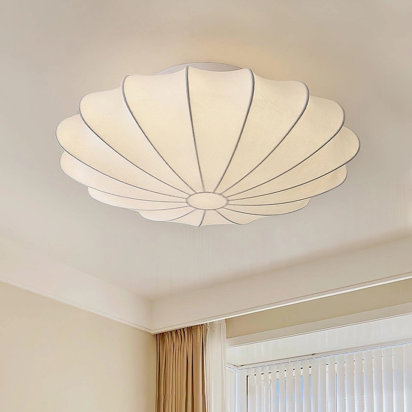 Bubble ceiling light fixture in study office space providing glare-free even illumination for work