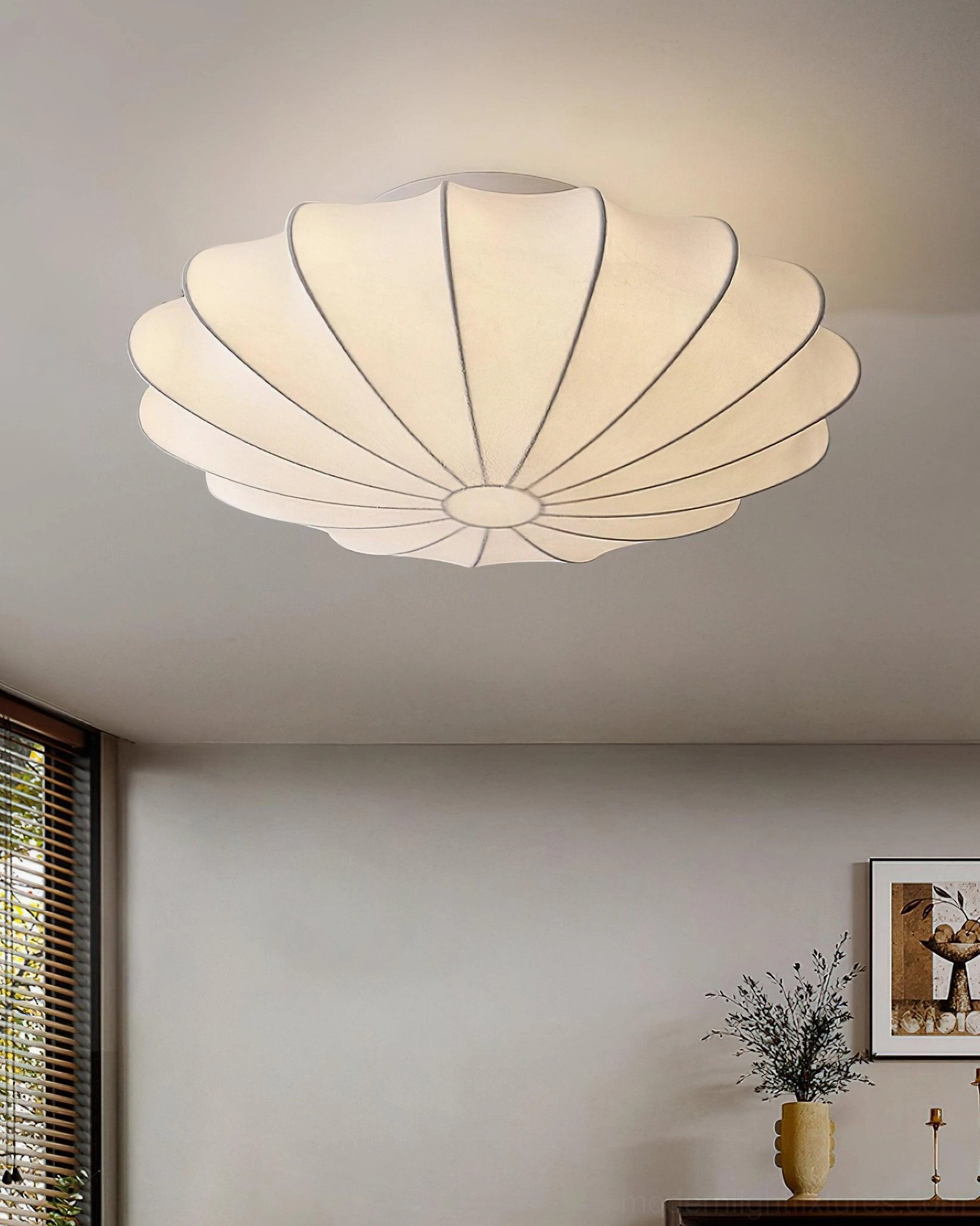 Bubble ceiling light silhouette showing seashell-inspired organic sculptural form on white background