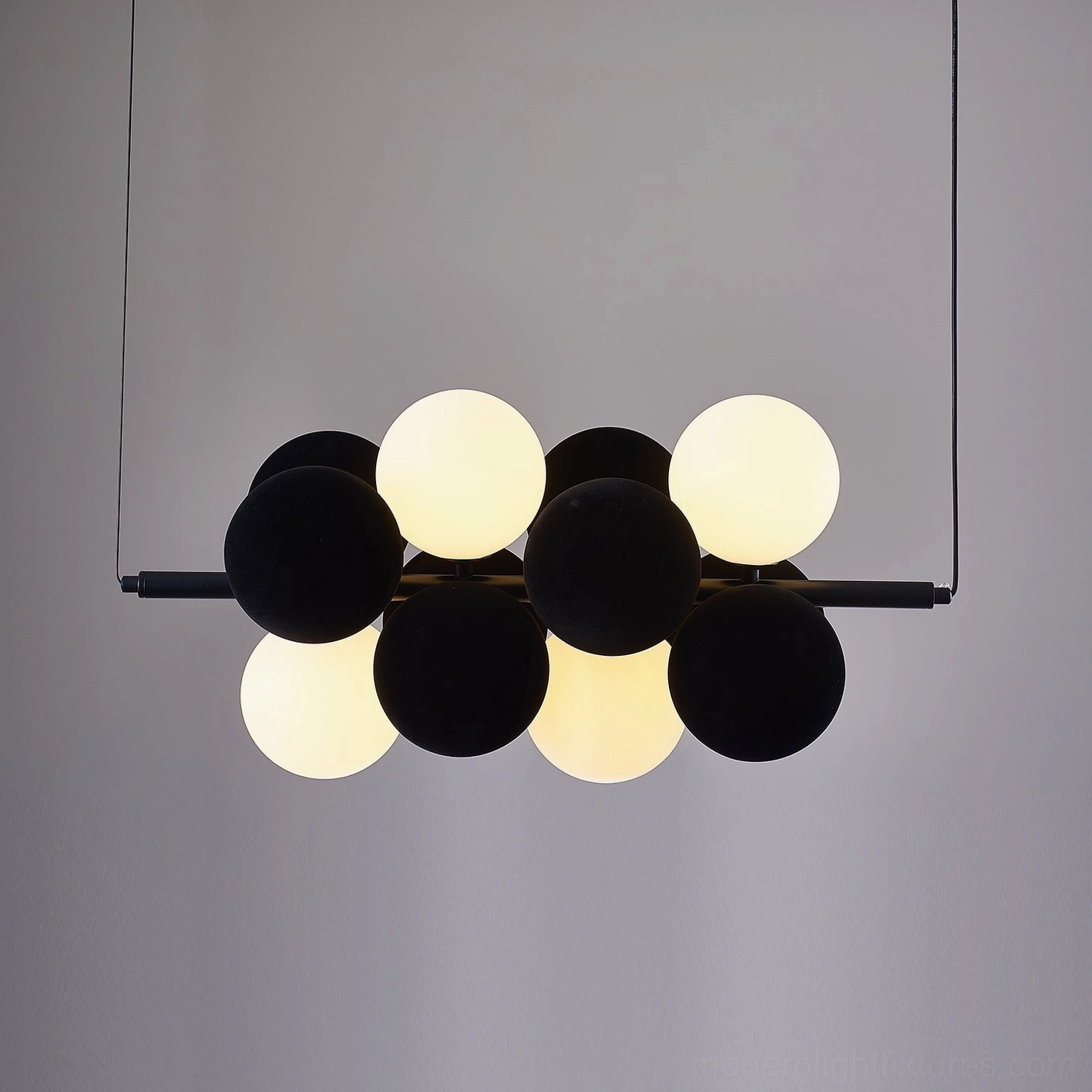 Bubble sphere pendant light diffuser creating soft warm illumination and ambiance